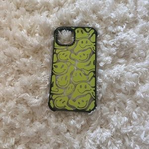 Castefiy phone case. Neon green smiley faces.